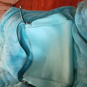 Turquoise Kate Spade bag.  Leather.
